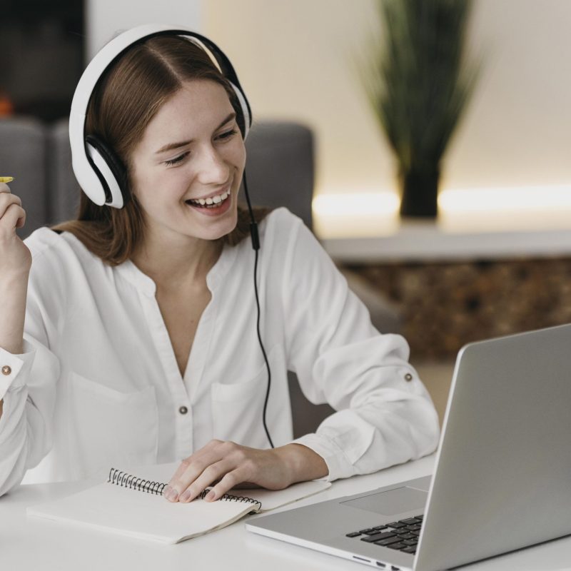 happy-teacher-talking-with-her-students-online